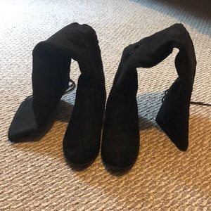 Tall black boots